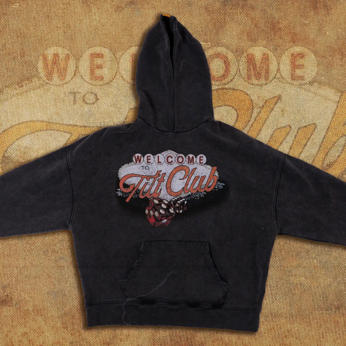 Vintage-inspired hoodie with a 'Welcome to Tilt Club' design, featuring retro typography, dice graphics, and a classic Las Vegas aesthetic. Perfect for casual wear with a touch of casino style.